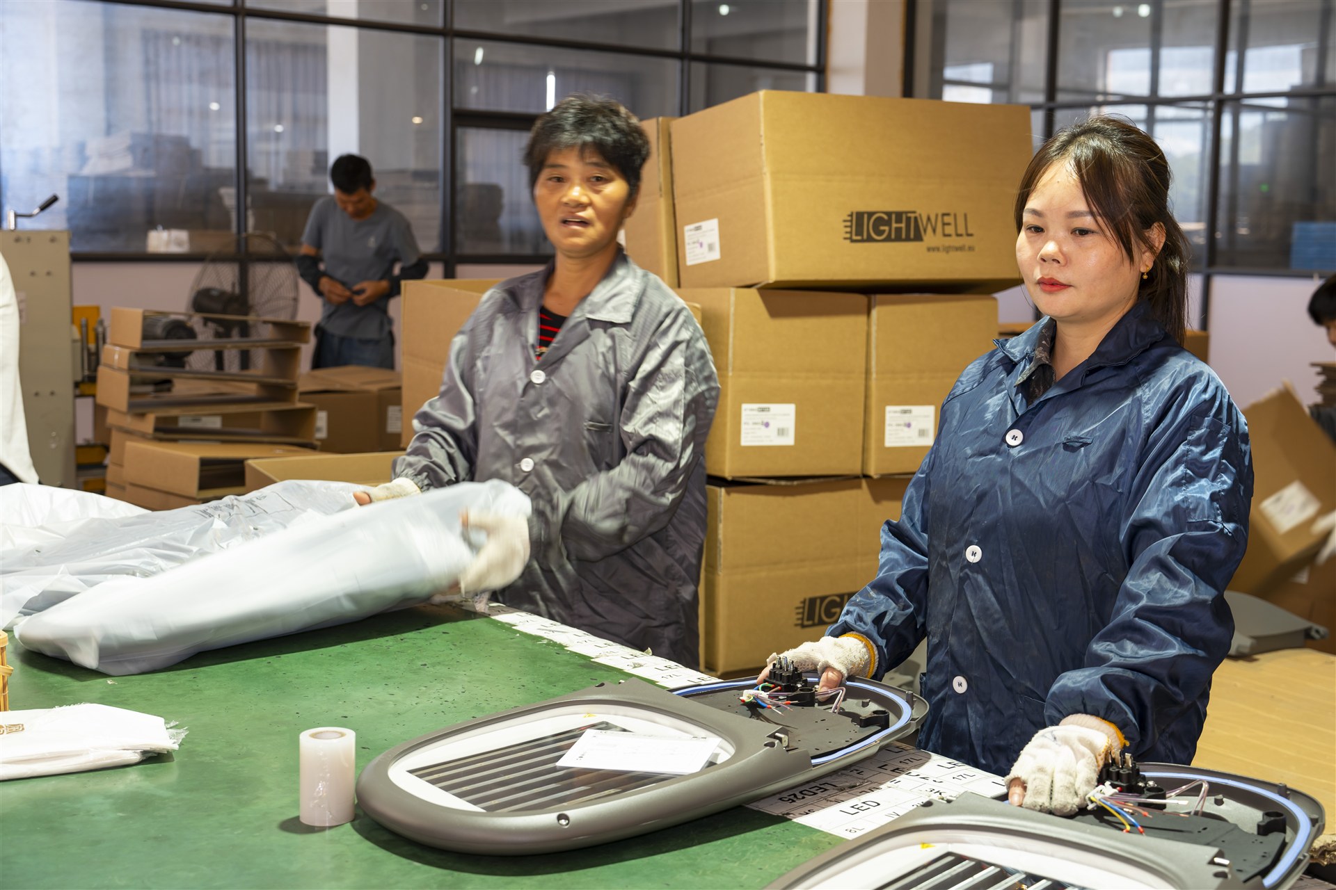 LUXIFIC technicians assembling outdoor luminaires