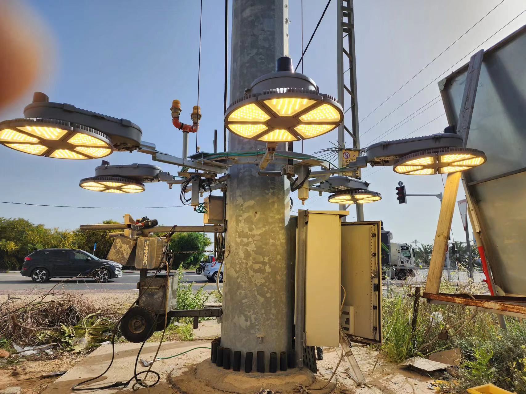 Helios high-mast luminaires illuminated during a real roadside field installation