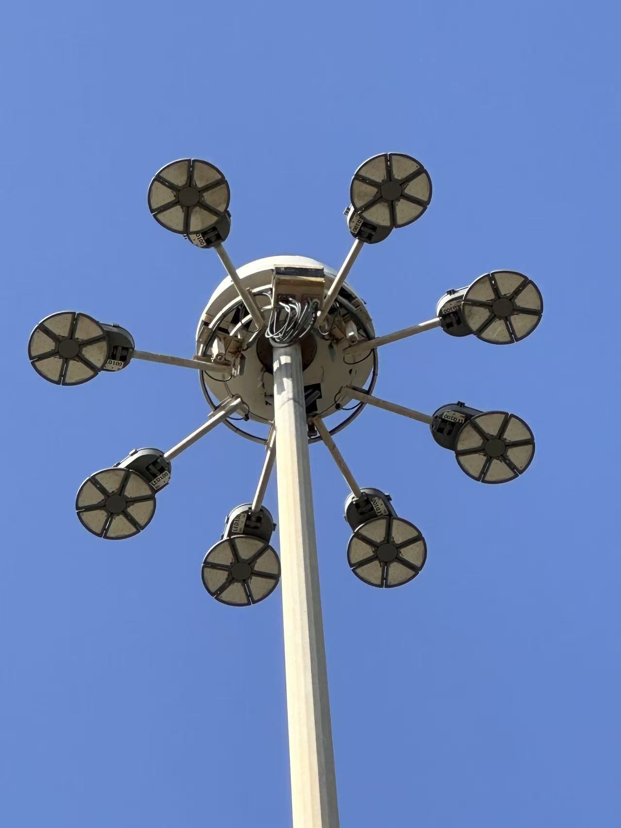 HELIOS luminaires arranged around a high-mast assembly at the Asia project site.